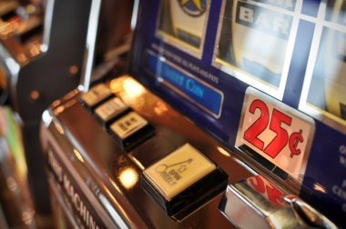 Live dealer revealing cards in Kembang Kempis game